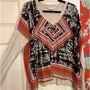 Cabi transition into Fall too! Vibrant colors.  Great with jeans!  Size M